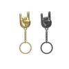 Porte-clés Rock hand Keyring - noir ou doré (aléatoire)